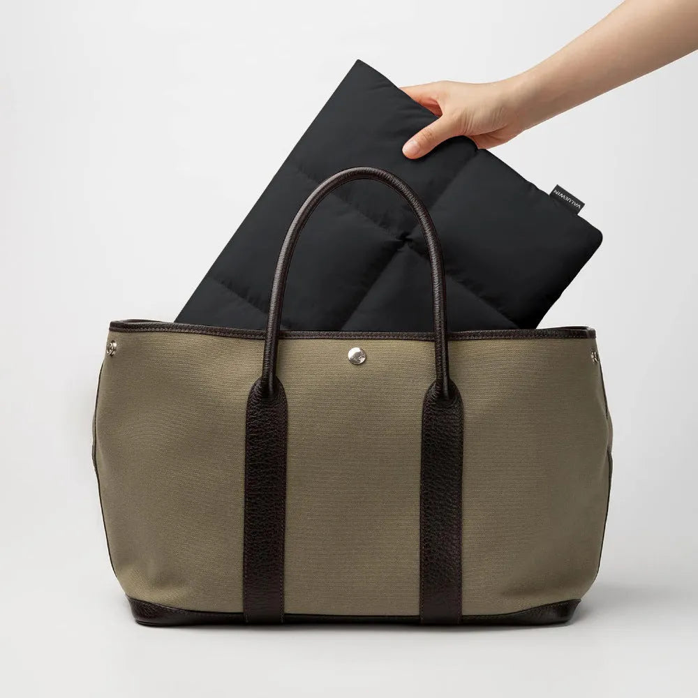 Soft fluffy polyester laptop sleeve in black or khaki colour protecting 13-15.6 inch computer