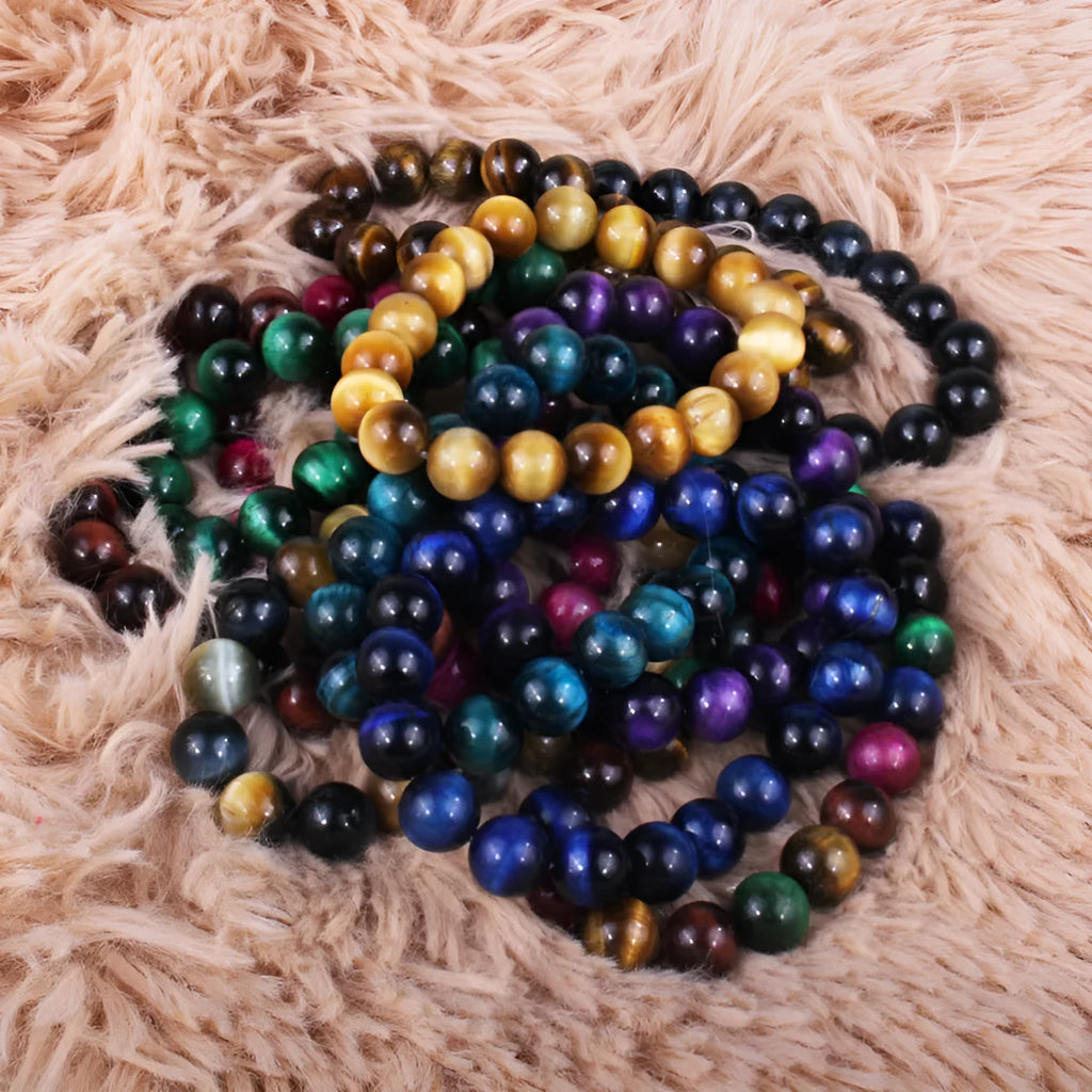 Natural tiger eye crystal bracelet with round beads in a choice of colours and sizes.