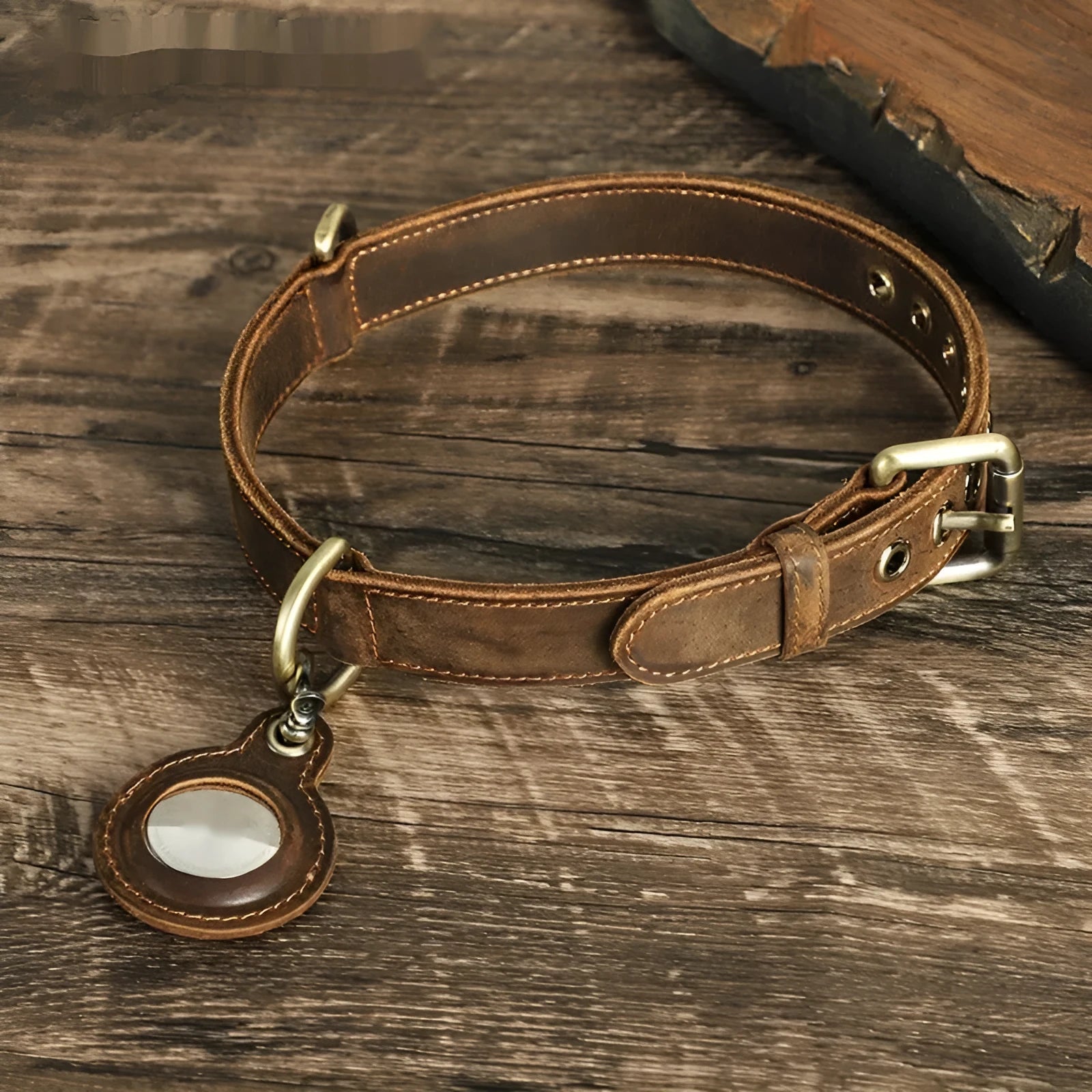 Brown handmade double-sided cowhide dog collar showing halter positioning and tracking features