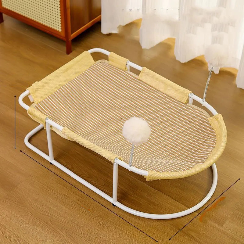 Grey fabric cat kennel with a metal bracket frame on a wooden floor.