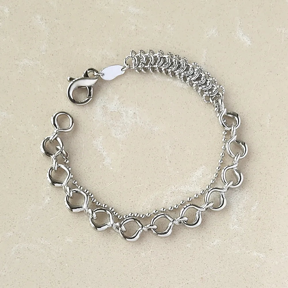 Metal wind venom splicing bracelet in silver, simple unisex design with copper and platinum plating