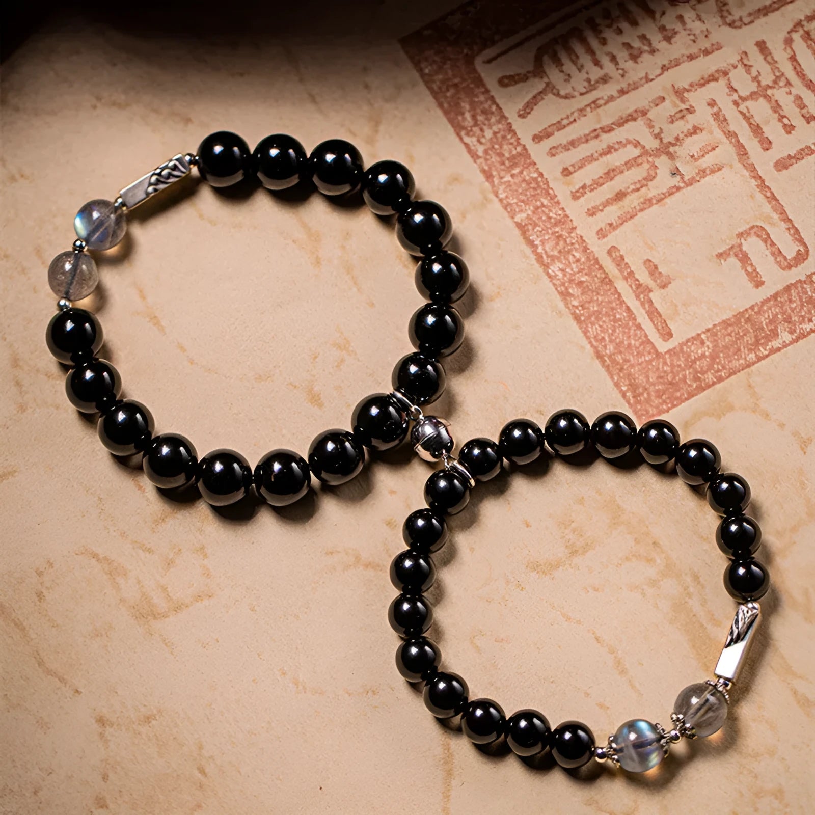 Black obsidian Buddha beads couple bracelet DIY set showing 8mm and 10mm bead sizing