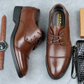Men's black leather lace-up business shoes with rubber sole and stitching details