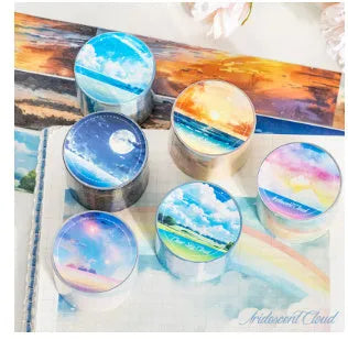 Roll of Japanese paper sky theme washi tape showing colourful clouds design, 30mm wide.