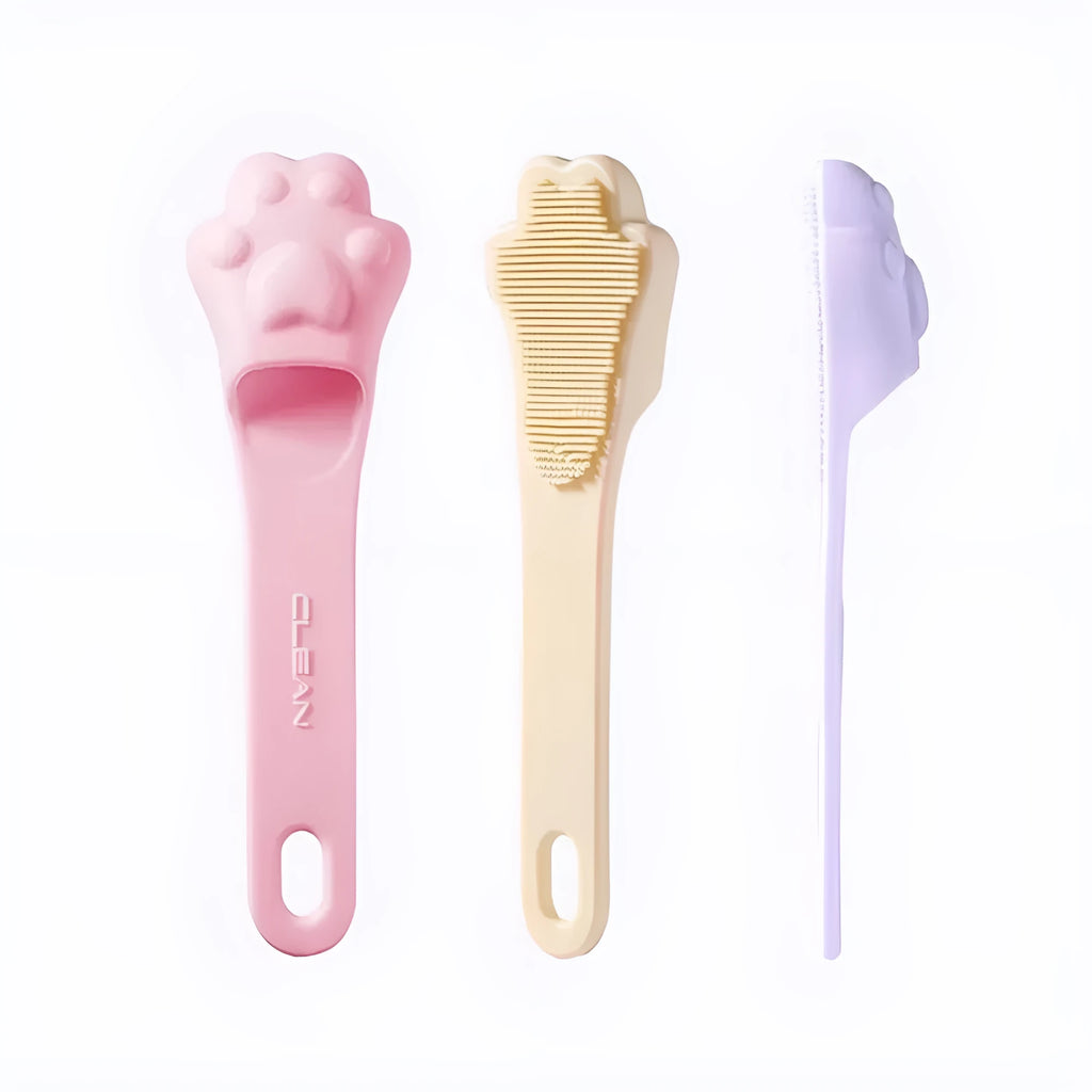 Pink silicone finger toothbrush for dogs and cats with soft nubby bristles.