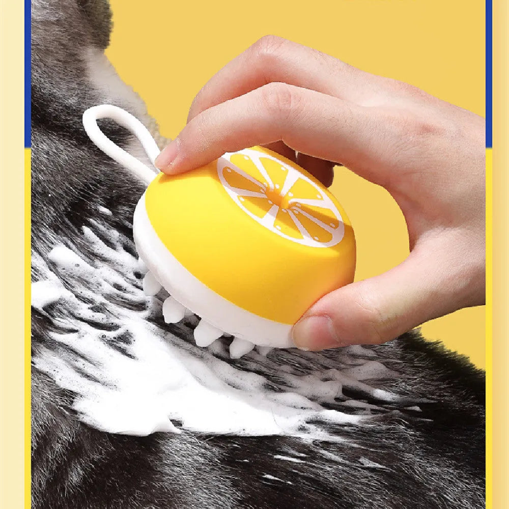 Yellow silicone pet bath brush with 3D massage head for dog and cat grooming during bath time