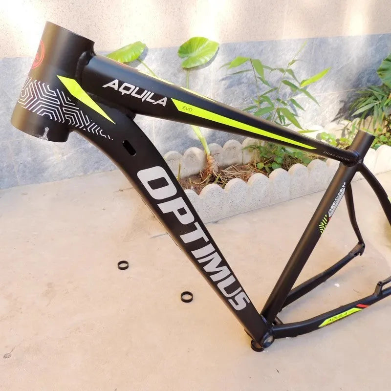 Black green 29-inch aluminium mountain bike frame showing disc brake mounts and inner line routing
