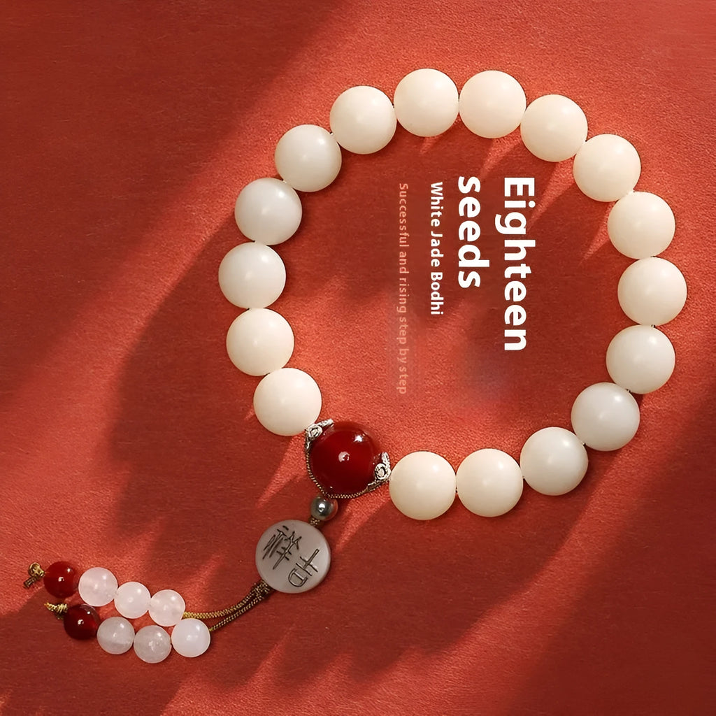 White jade Bodhi couple bracelet with 10mm round seeds in obsidian, red stone, and red code brain colours