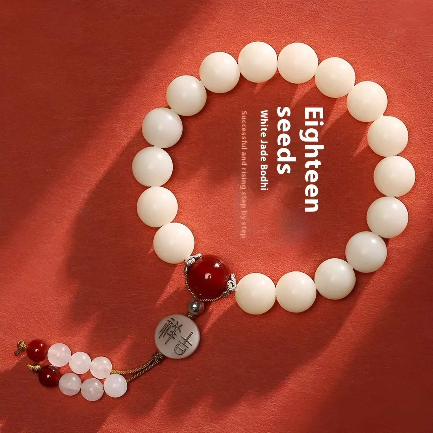 White jade Bodhi couple bracelet with 10mm round seeds in obsidian, red stone, and red code brain colours