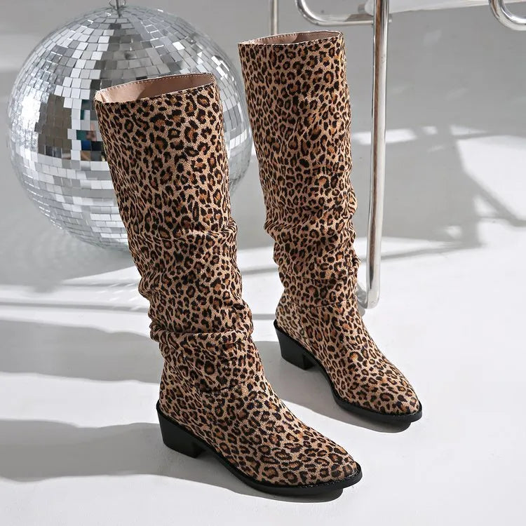 Brown leopard print women's boots with a square toe and chunky mid-height heel.