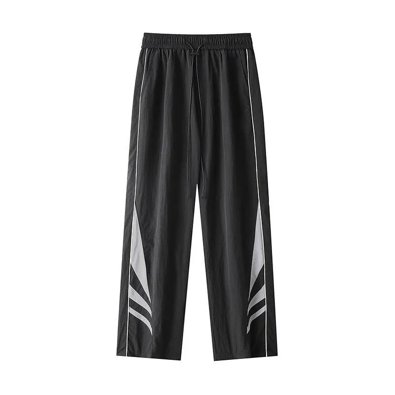 Men's straight leg casual trousers in black, featuring a mid waist with elastic and a cardigan button fly.