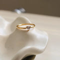 Golden love heart stainless steel ring for women on a simple band, shown in sizes no.5 to no.8