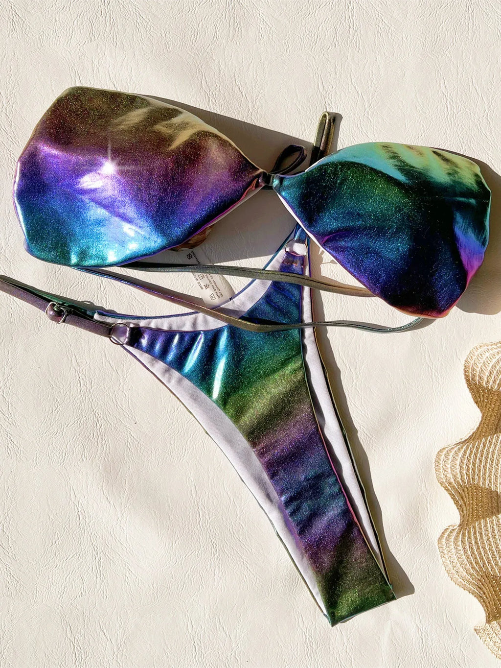 Women's gradient purple polyester bikini swimsuit top and bottom set.