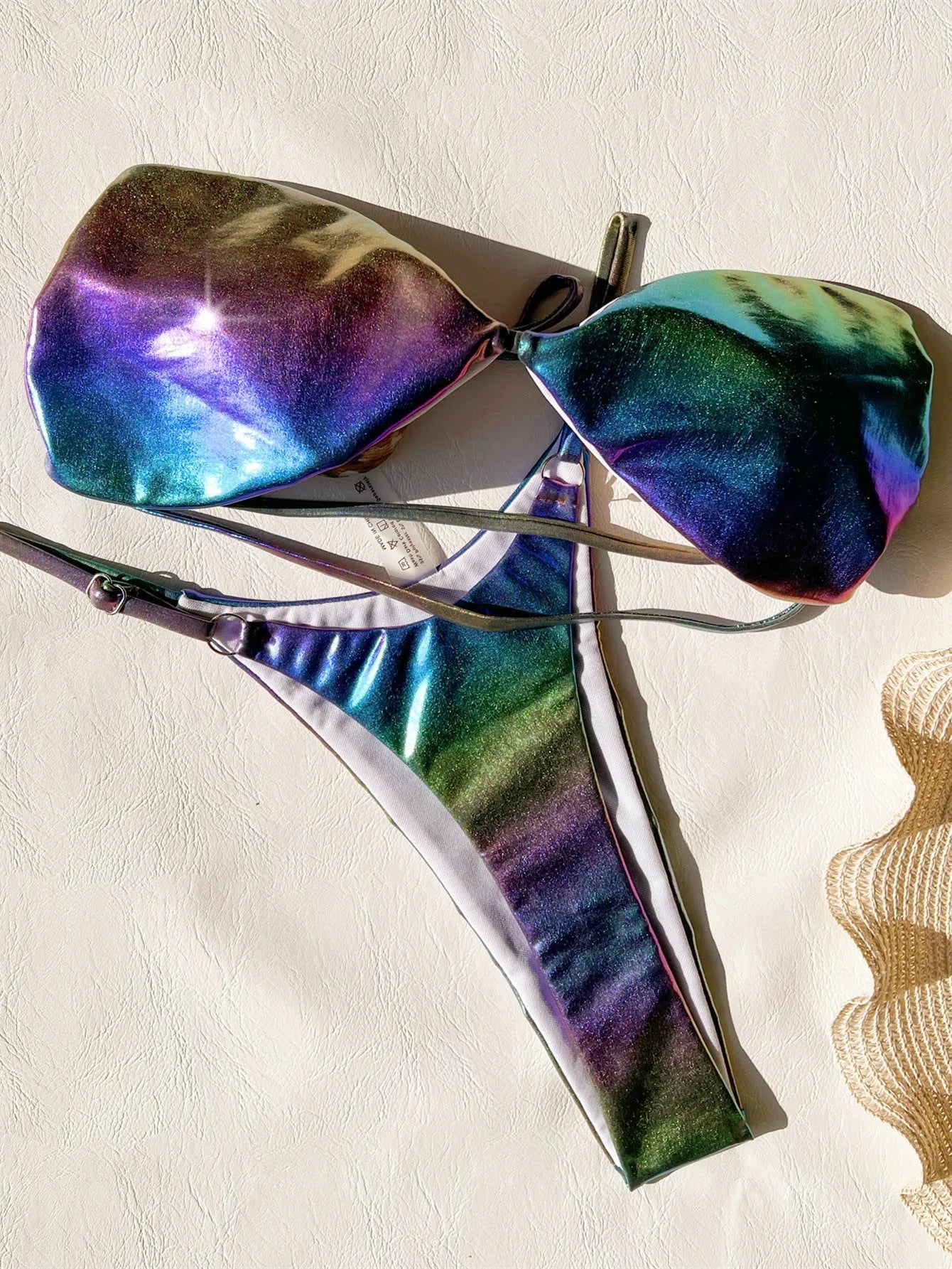 Women's gradient purple polyester bikini swimsuit top and bottom set.