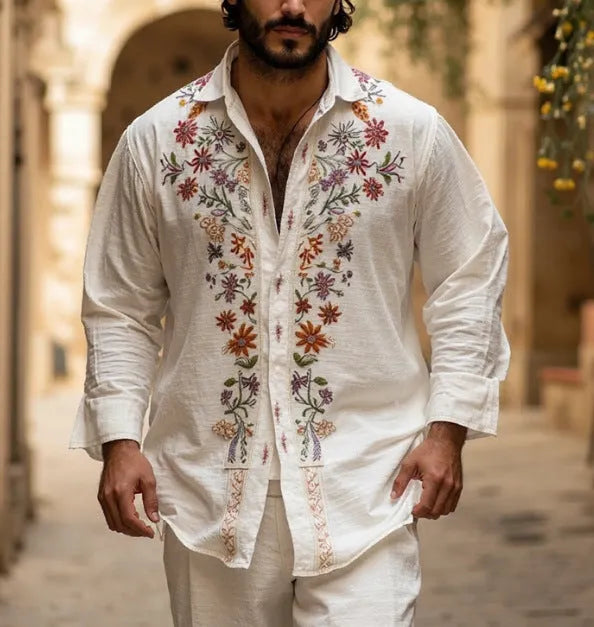 Man wearing a retro-style grey long sleeve cardigan with a 3D printed pattern.