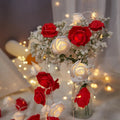 Battery-powered LED rose light string with ten artificial foam roses for indoor holiday decoration