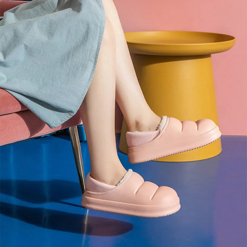 Women's waterproof winter house slippers in various colours with EVA construction and non-slip sole