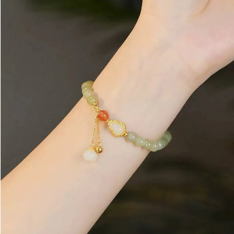 Qingshui jade women's bracelet with gold-plated gourd charm and fu character