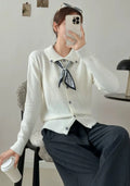 Lapel scarf sweater in cardigan style with long sleeves and splicing details