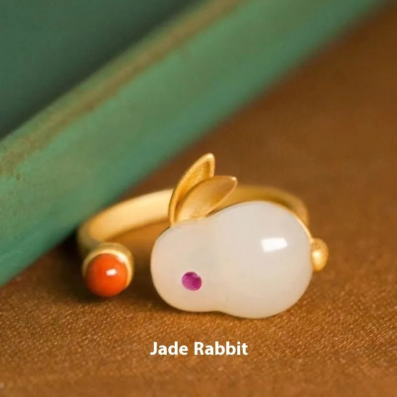 Green mixed-material jade hare bracelet with electroplated finish and lily decorative elements