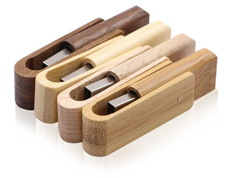 Pink wooden USB flash drive 2.0 with rotating clip, 60x19x8mm, on a plain background