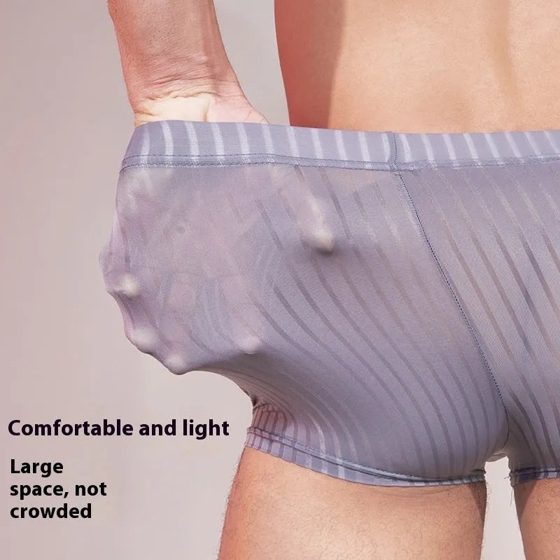 Men's black striped nylon underwear, thin and lightweight briefs laid flat.