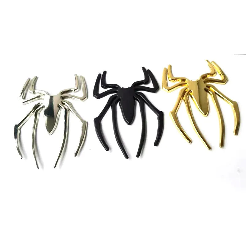 Three-dimensional zinc alloy spider emblem sticker in gold, measuring 7cm by 5cm.