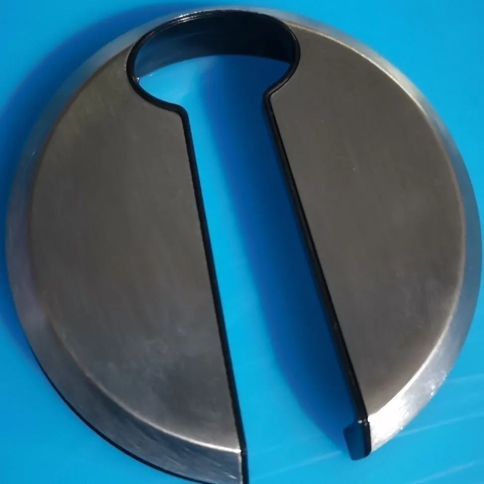 Stainless steel kitchen tool with combined wine bottle opener and foil cutter.