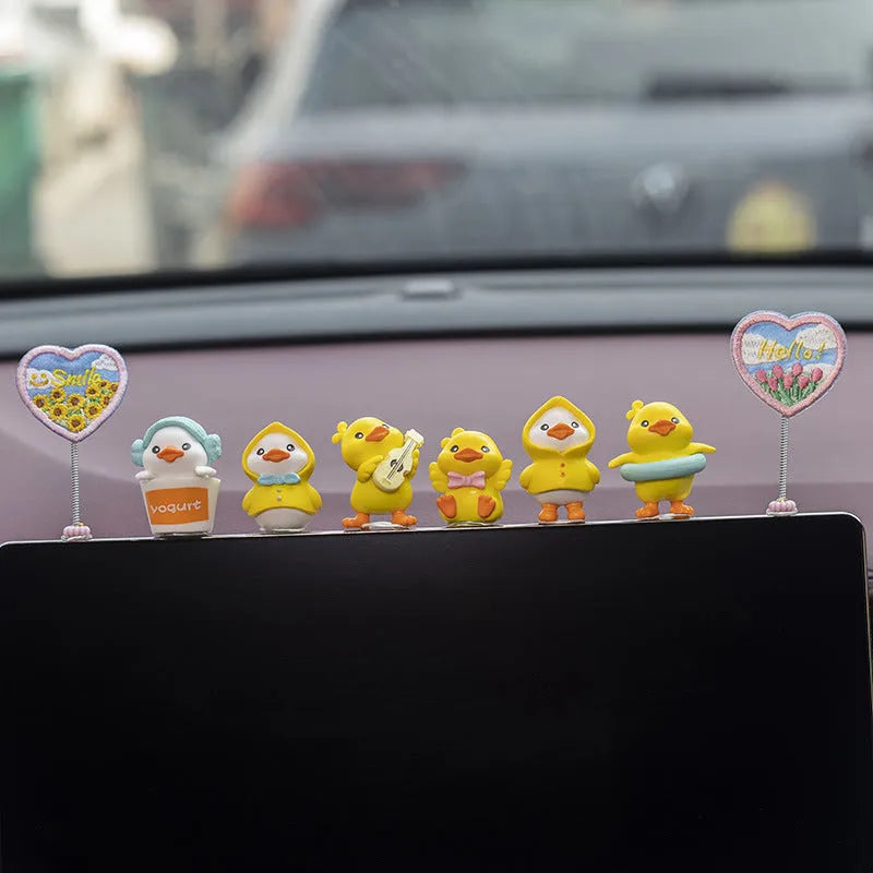 PVC cartoon duckling car decoration set with six ducks and one Hello sign.