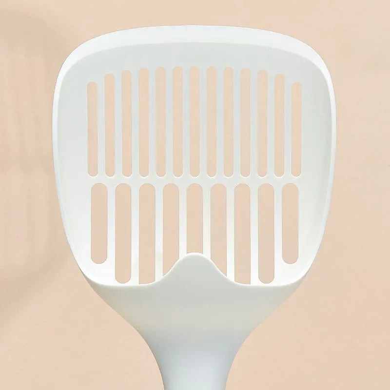 White plastic cat litter scoop with a self-cleaning base on a white background.