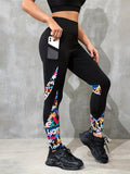 Women's black high-waisted cropped sports leggings with pocket detail and leopard print design