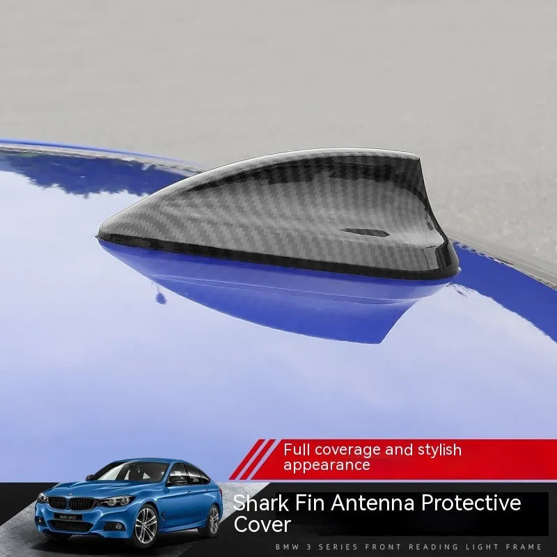 BMW shark fin antenna cover in carbon fibre pattern and piano black finish options.