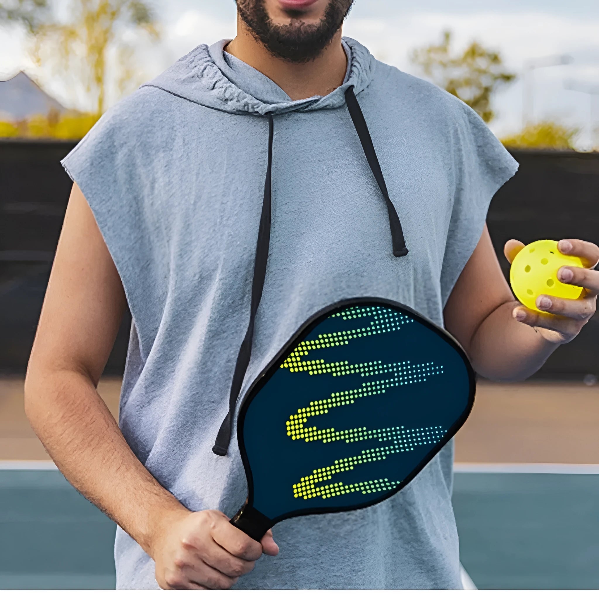 A single high-density fibreglass table tennis racket for outdoor sports use.