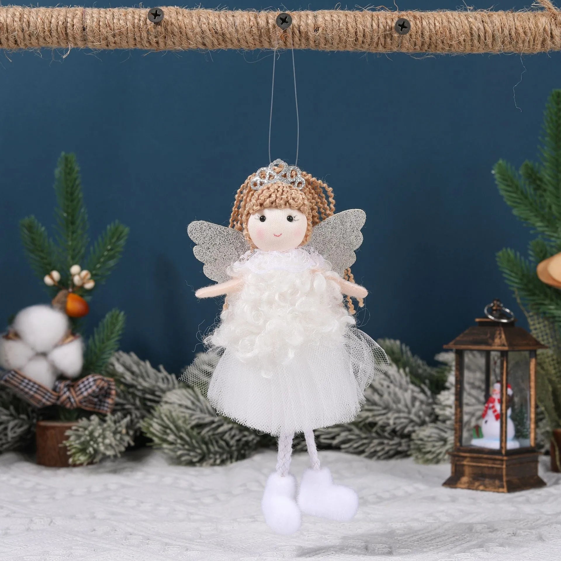 Cartoon angel cloth hair clip pendant for Christmas, shown on a high ponytail.