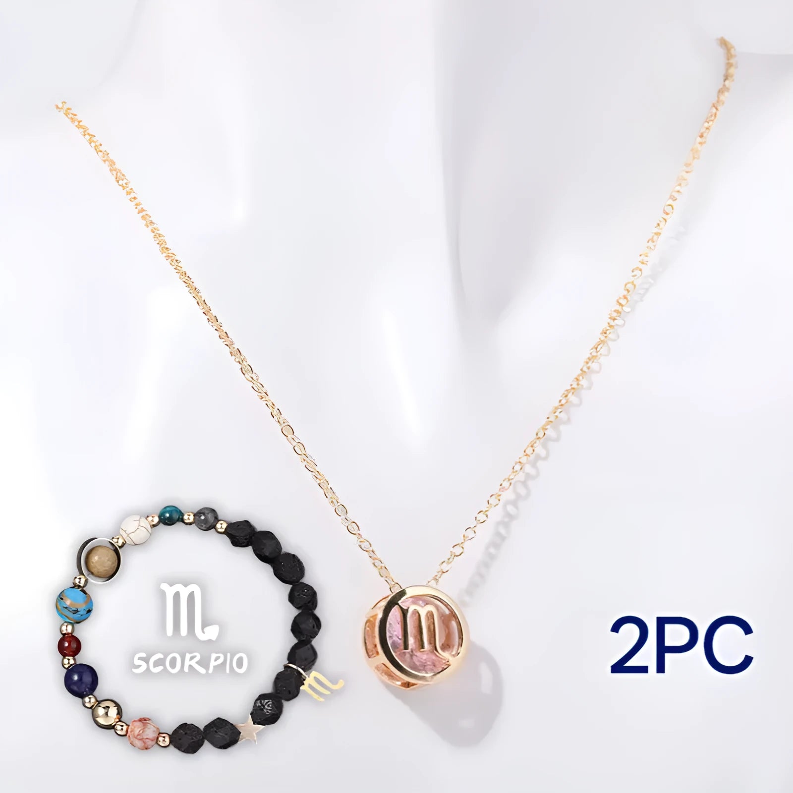 Natural stone beaded necklace and matching bracelet set on a textured background