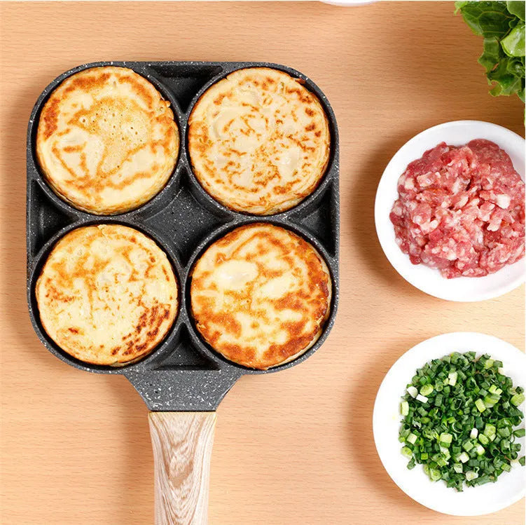 Non-stick aluminium egg dumpling frying pan with four round holes for cooking breakfast burgers or dumplings