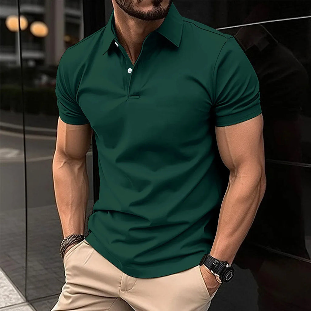 Man modelling a solid colour short sleeve polo shirt with a buttoned lapel collar.