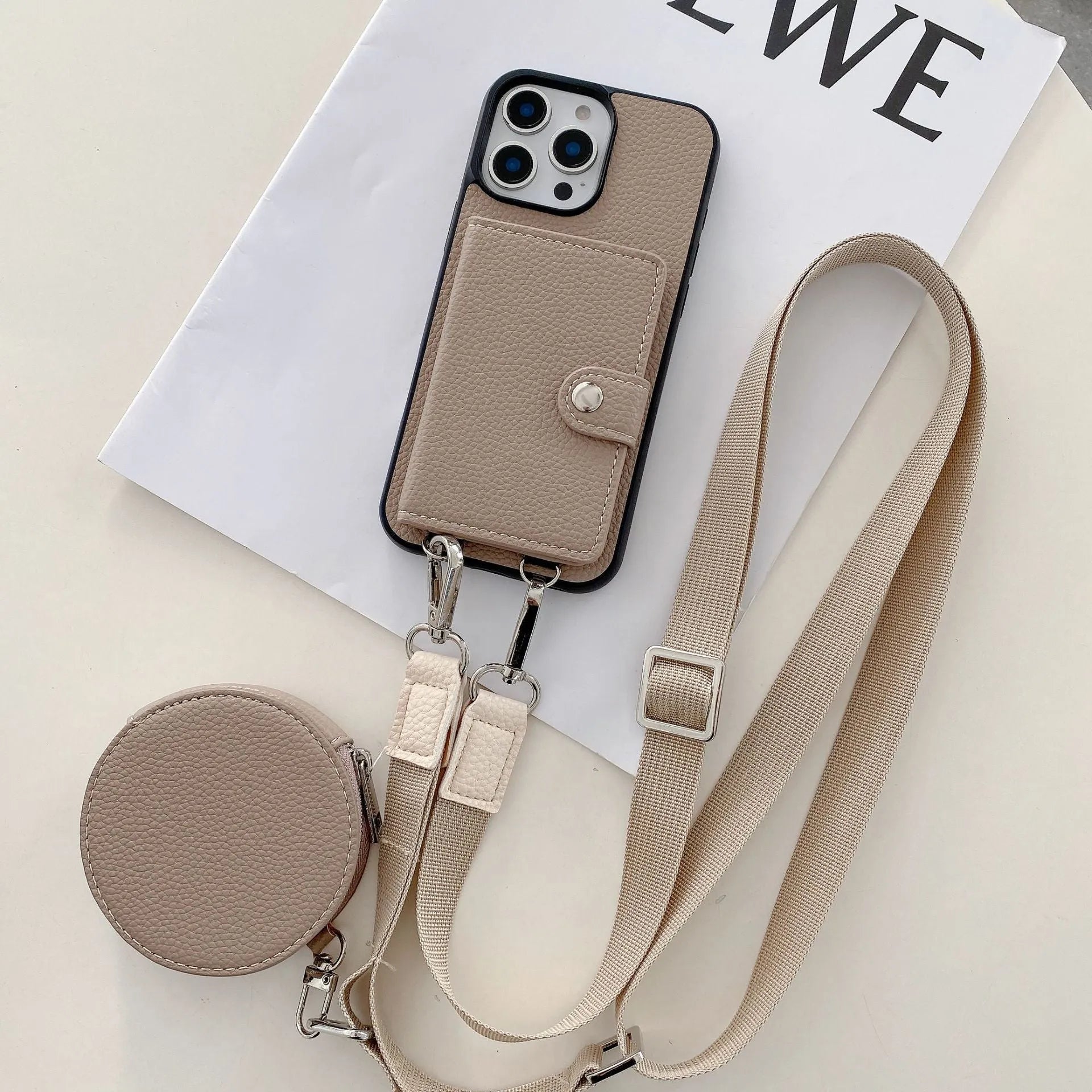 PC leather iPhone case with a card slot on the back and a lanyard loop, shown in multiple colours.