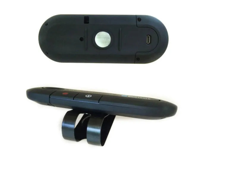 Black vehicle-mounted Bluetooth handsfree device clipped to car sun visor with aux cable