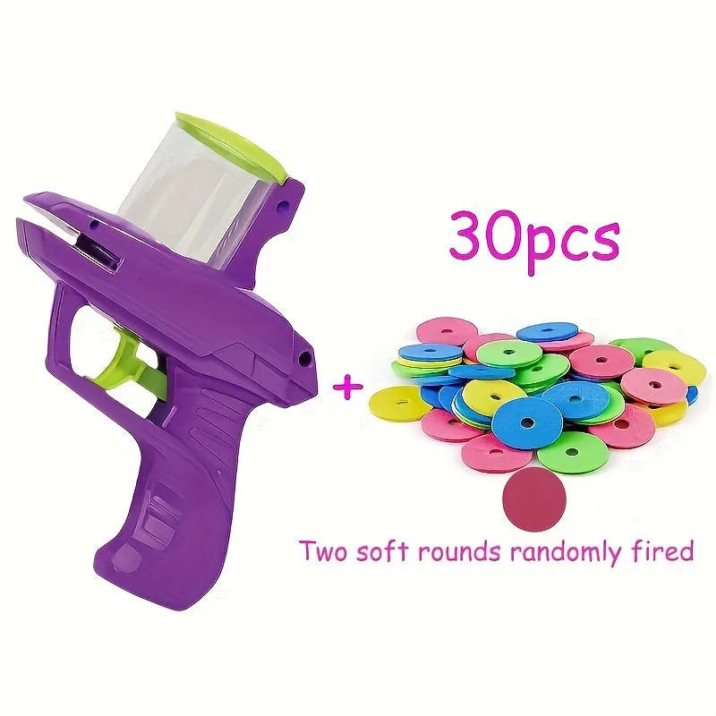 Interactive cat toy launcher with foam discs in green or purple durable plastic