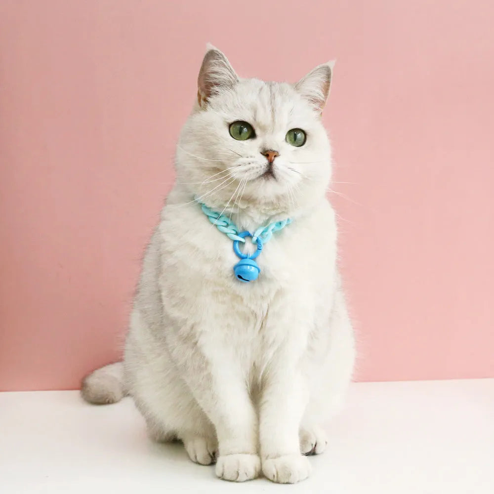 Plastic pet collar in macaron candy colours showing S and M sizes for cats, dogs, and rabbits