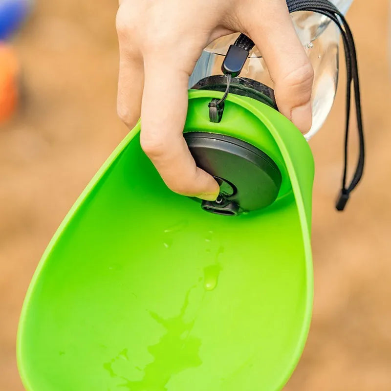 Sky blue portable dog water bottle with drinking bowl and hanging strap.