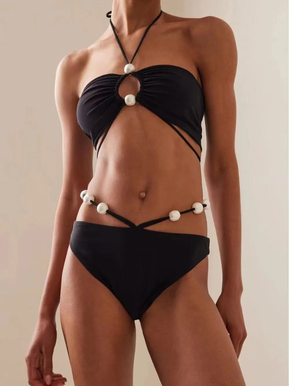 Women's black split lace-up bikini swimsuit with quick-drying nylon fabric