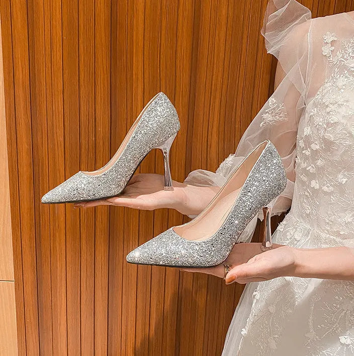 Women's bridal glitter high heels with pointed toe, fine 7cm heel, available in gold, red, and silver.