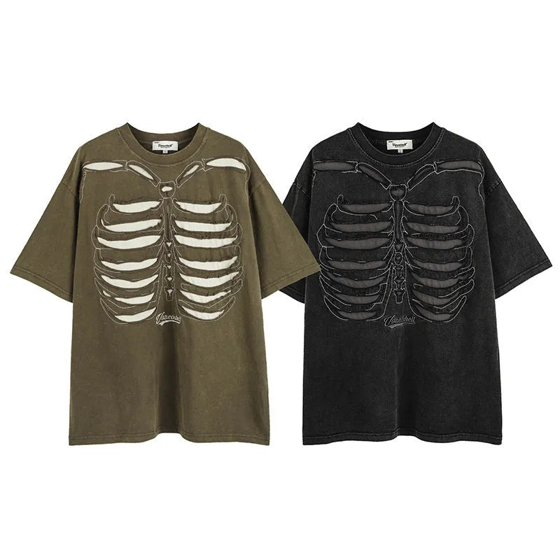 A man's black loose-fit cotton t-shirt with a skull and letter graphic print and drop-shoulder sleeves.