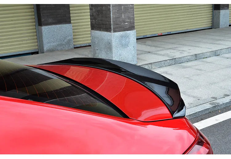 Mazda 3 Axela modified tail trim in bright black finish for 2014-2021 models