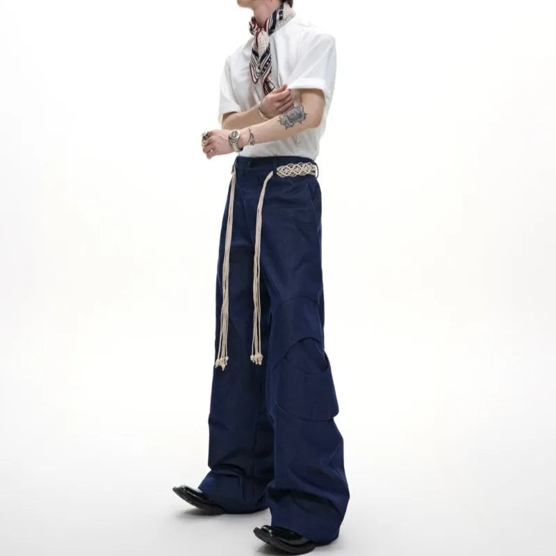 Men's straight-leg cotton trousers with loose fit, zip decorations and tassel detailing in dark colour options