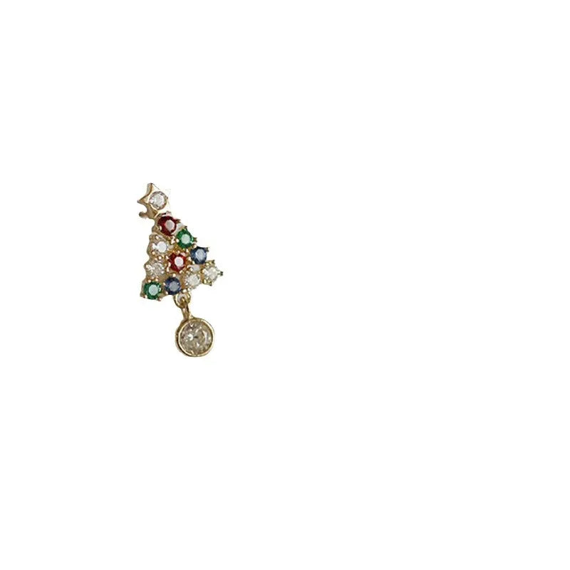 Gold Christmas stud earrings with diamond tree motif and water drop geometric shape on a light surface