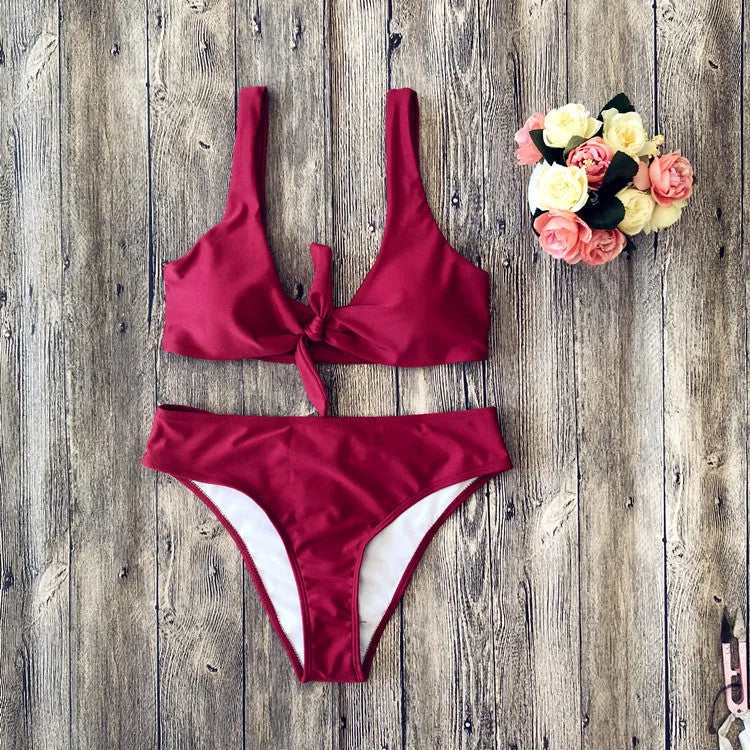 Women's solid colour bikini swimsuit set in polyester, shown in available colours.