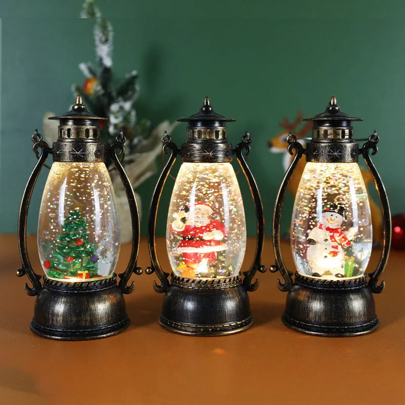 Portable crystal ball oil lamp Christmas decoration on a desktop, showing snowman and elderly figure options.